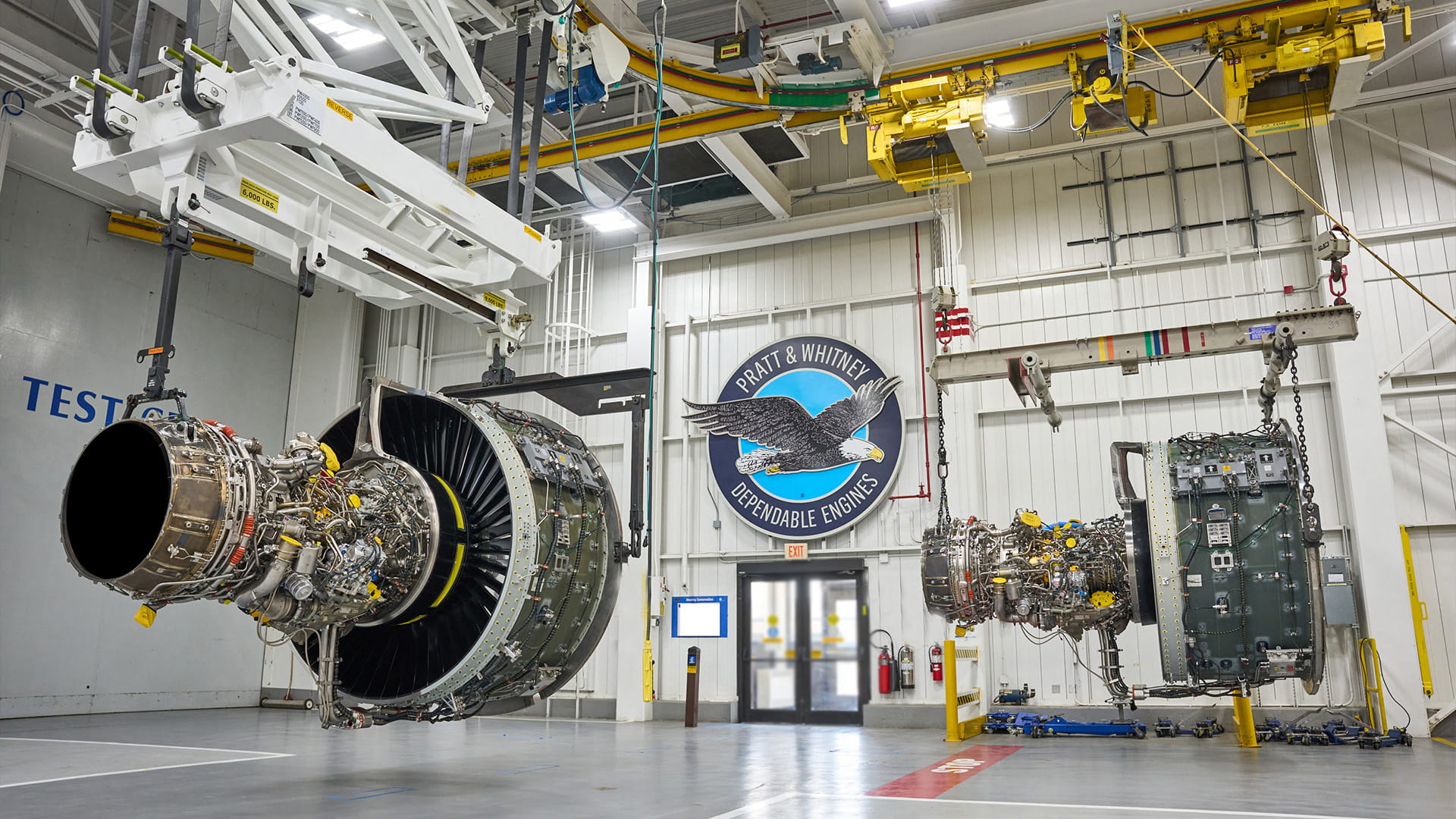Pratt & Whitney engine test factory floor showing two engines
