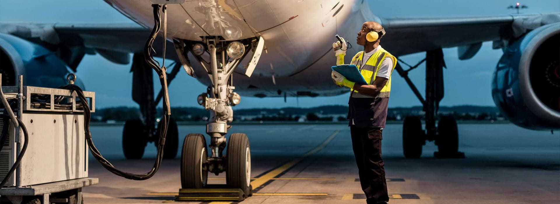 Aircraft maintenance check by employee