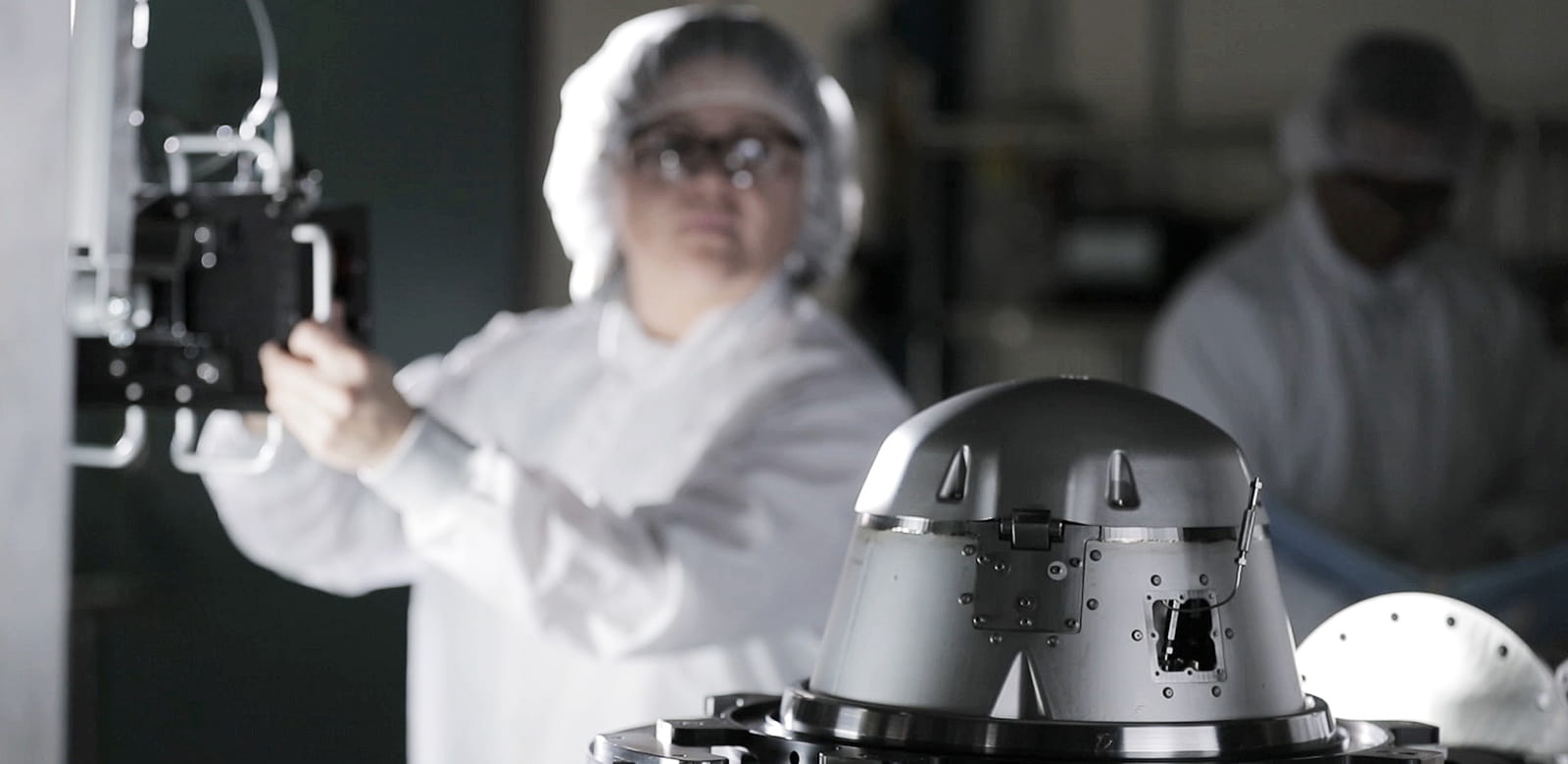 An employee working on a machine