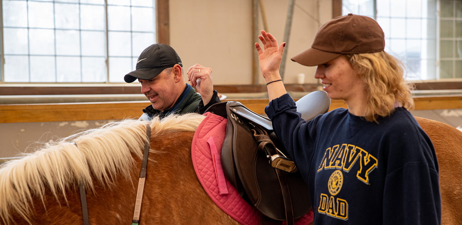 Raytheon employees volunteering at Ironstone Farm.