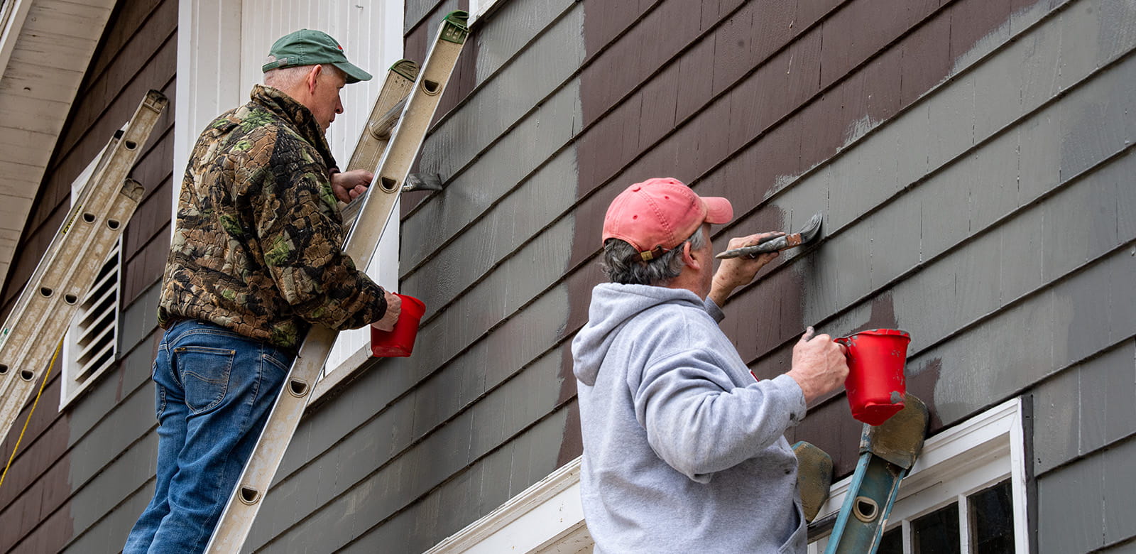 Raytheon employees volunteering at Ironstone Farm.