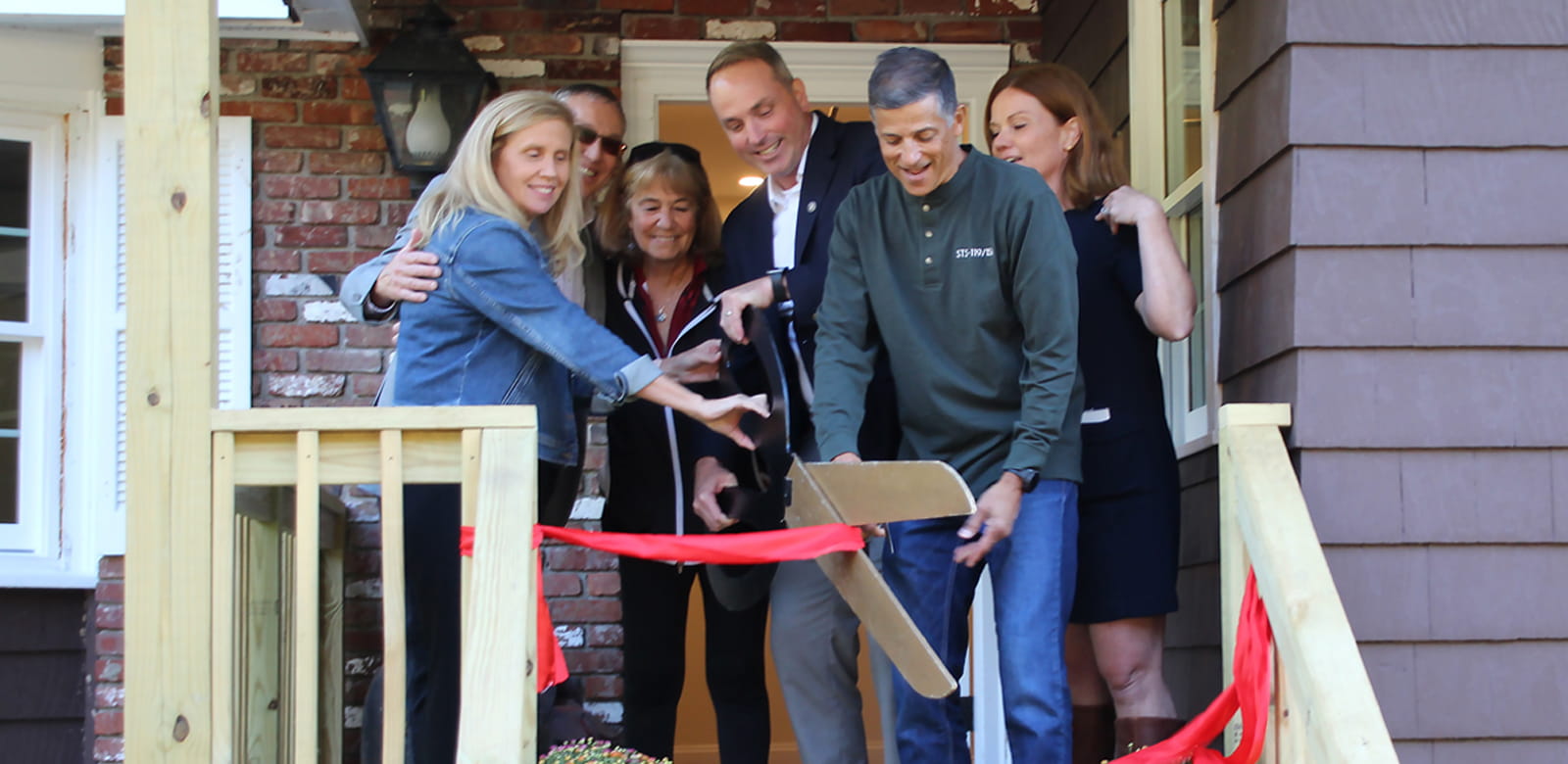 Raytheon employees volunteering at Ironstone Farm.
