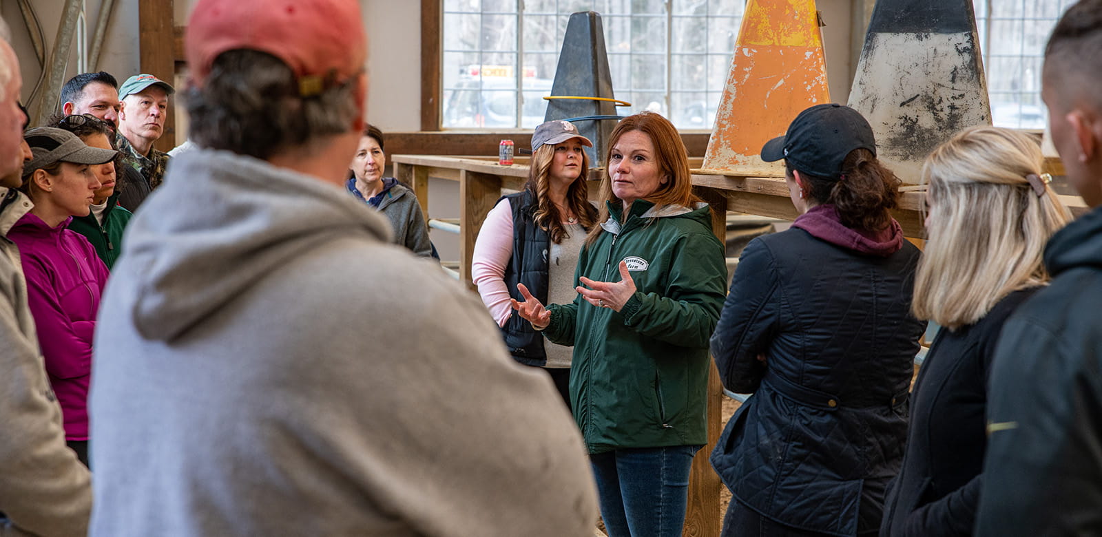 Raytheon employees volunteering at Ironstone Farm.