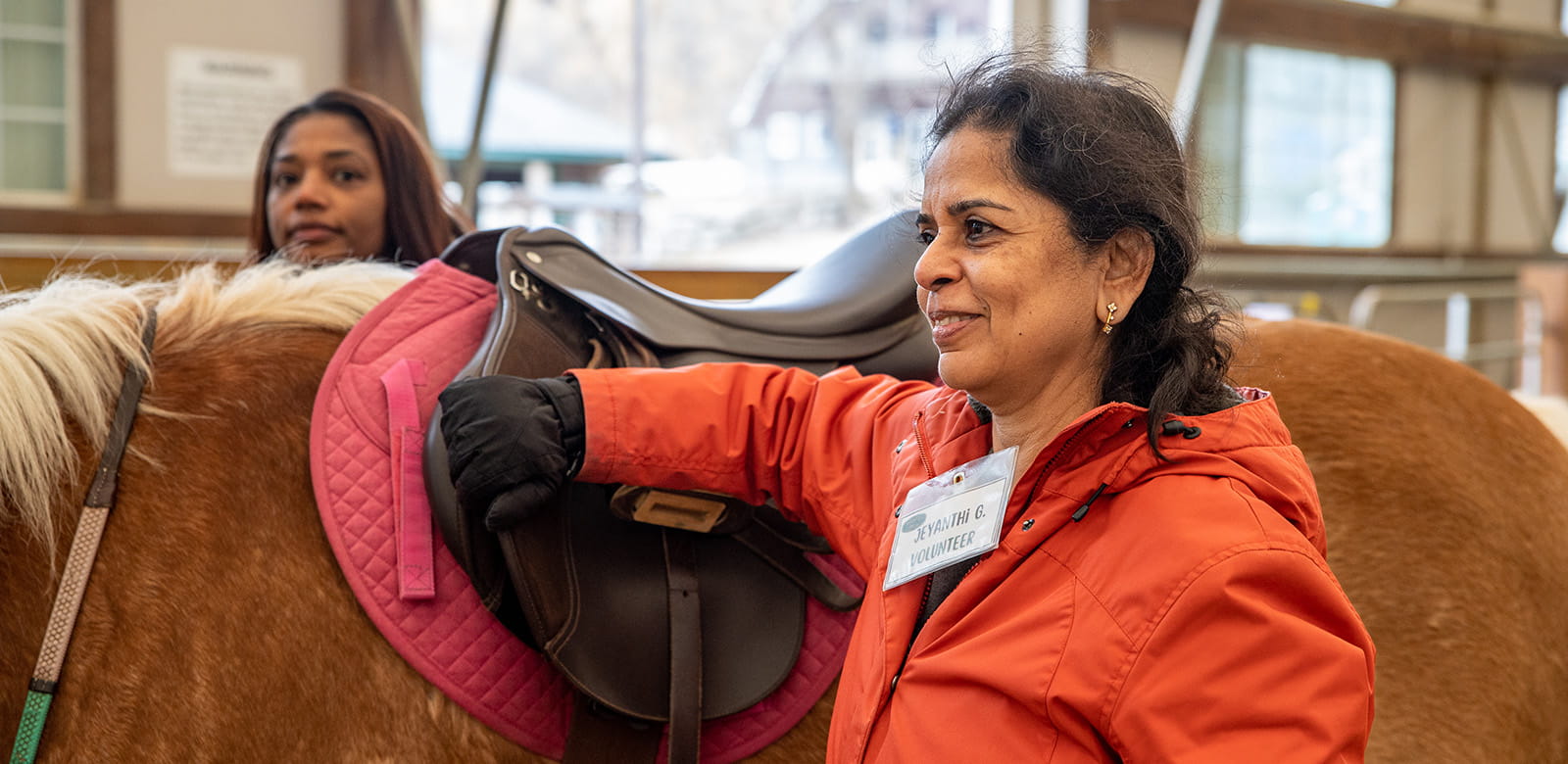 Raytheon employees volunteering at Ironstone Farm.