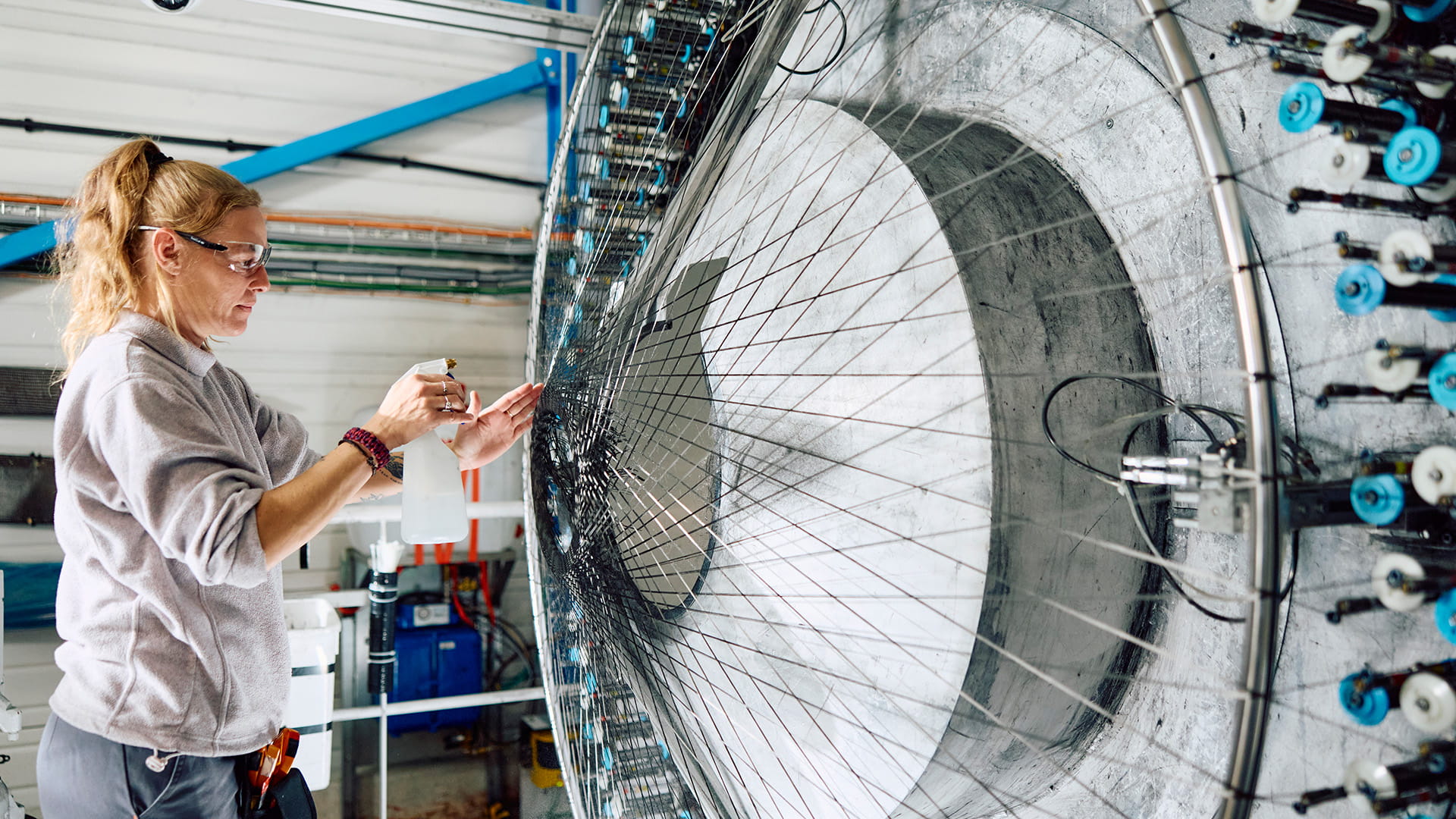 Collins employee working on structural support