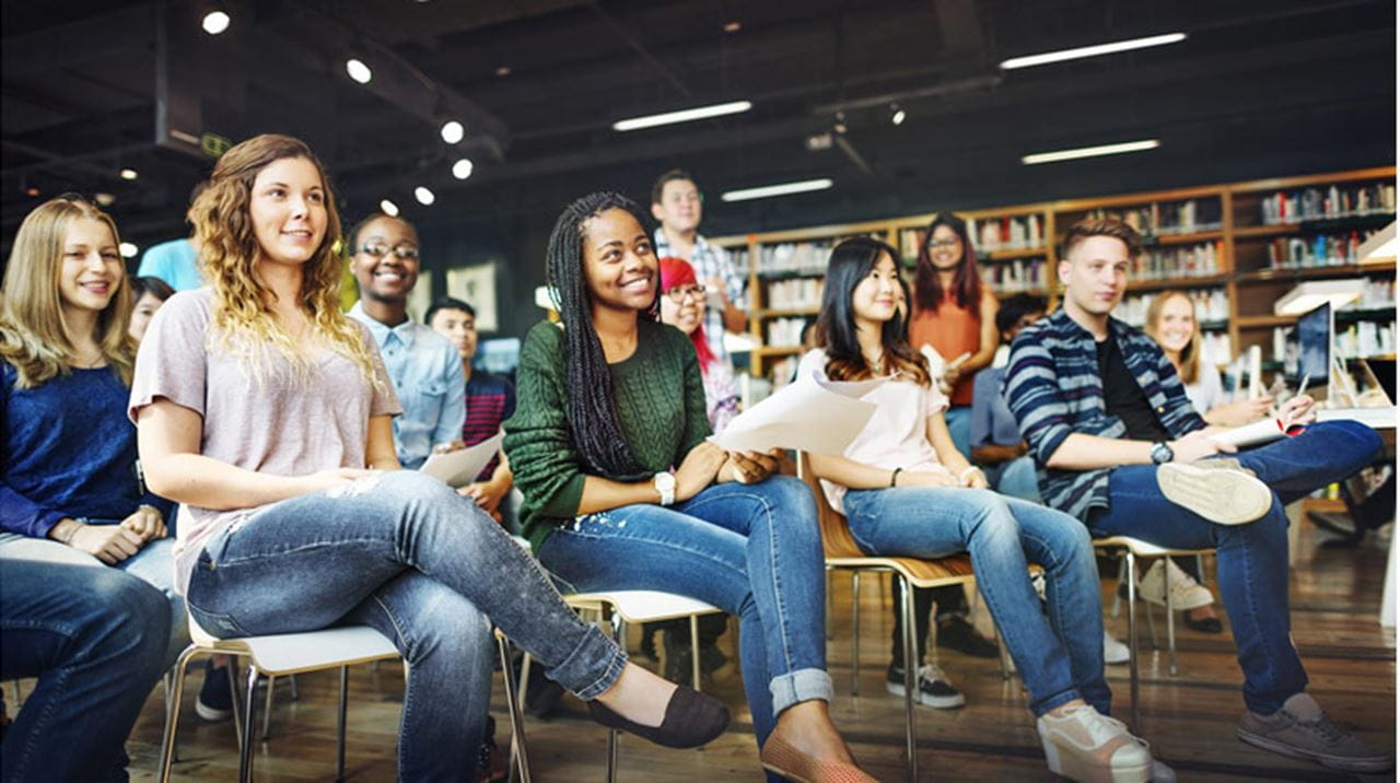 Group of students listening to a presentation