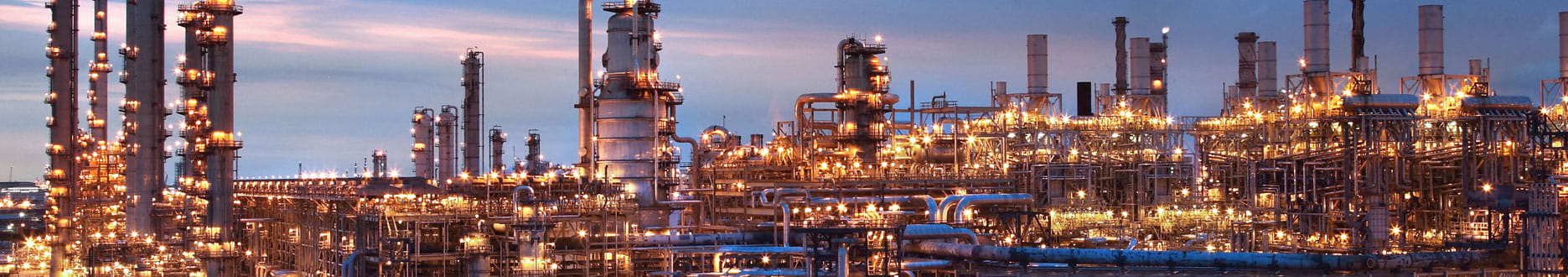 a large chemical plant at dusk