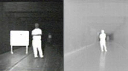 man standing in a hallway