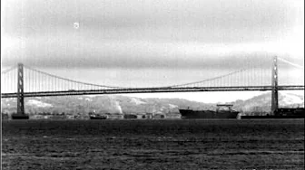 A Sensors Unlimited SWIR camera penetrates through haze to clearly see the San Francisco Bay Bridge, including the moving traffic and ships.