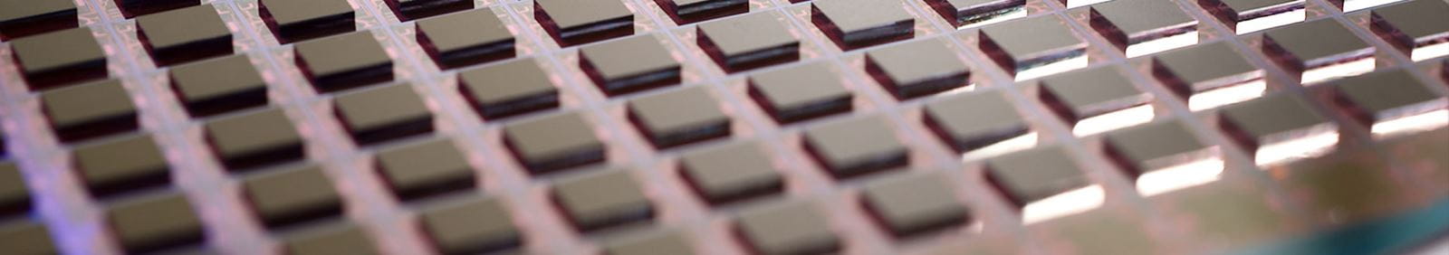 rows of square objects on a board