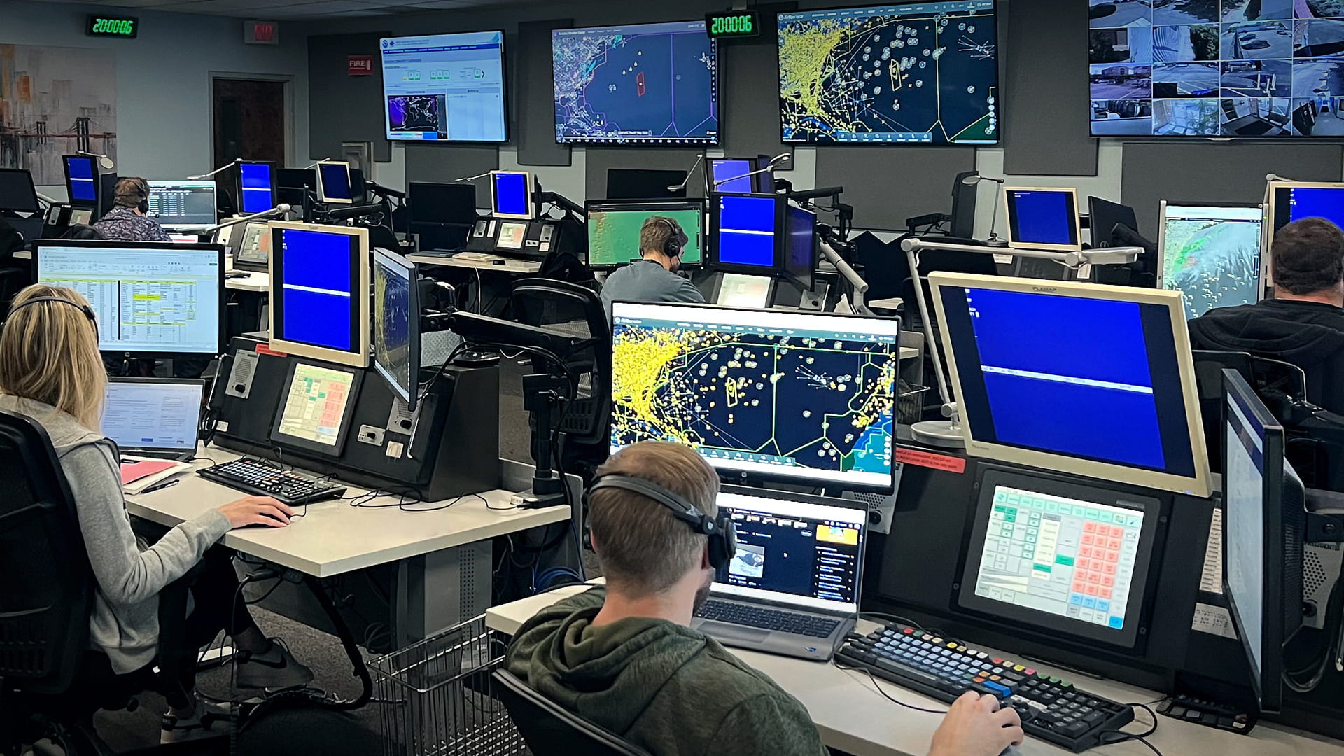 People in front of computers in a call center