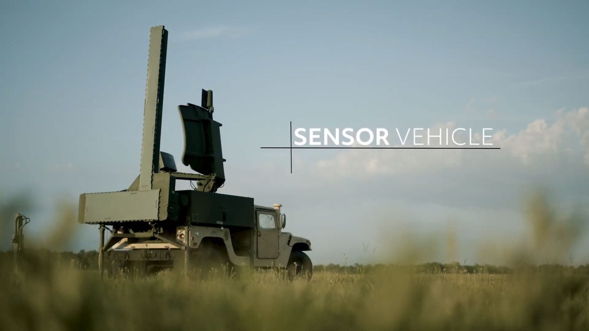 A military vehicle carrying sensor equipment