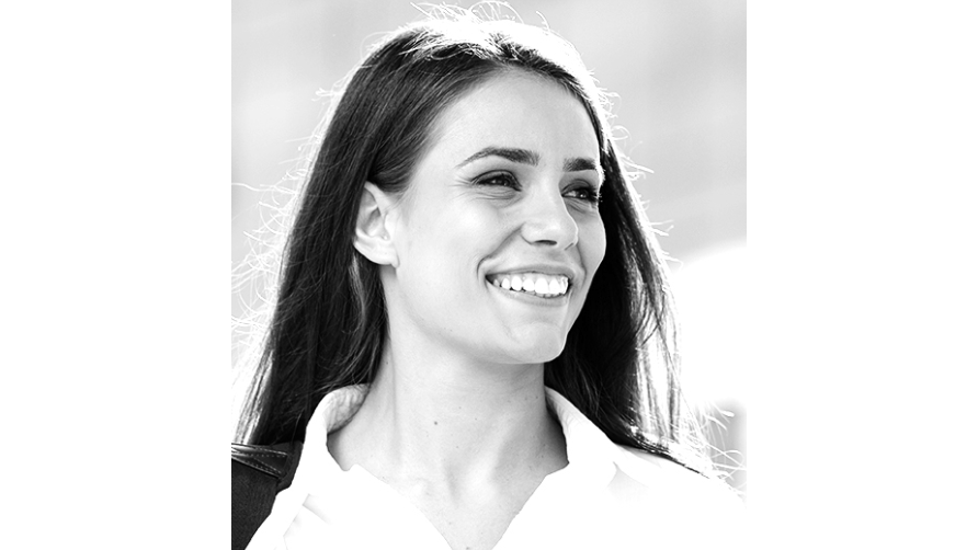 Woman smiling to the right