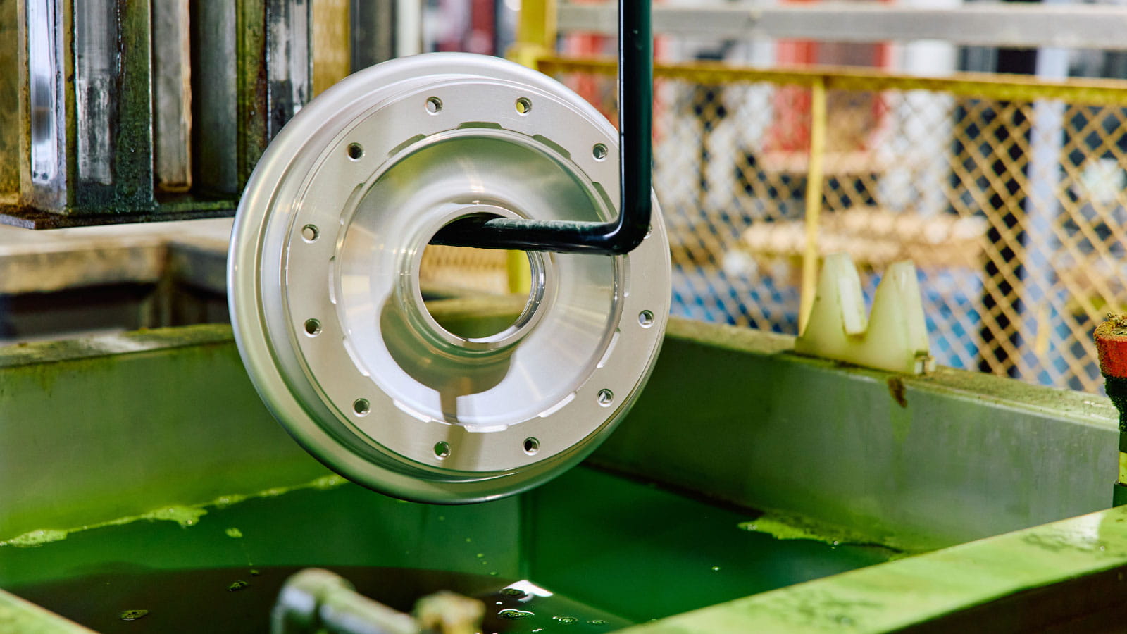 Material finish, a chemical process, is used to smooth, texturize and clean the surface before painting a wheel.