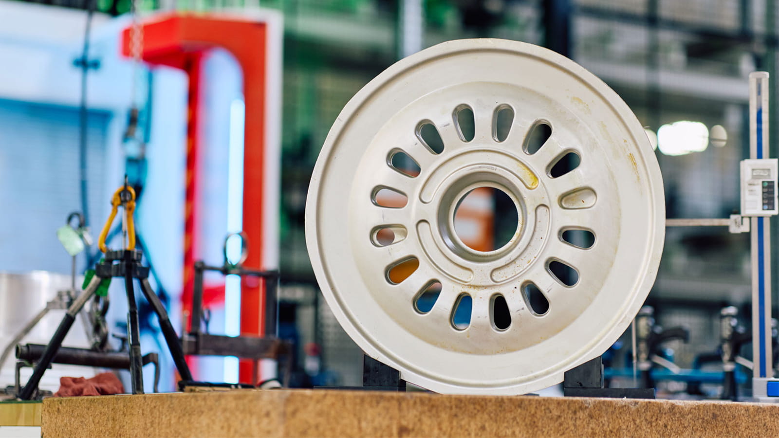 The wheel-building process starts with “raw forging,” or a rough aluminum alloy casting.