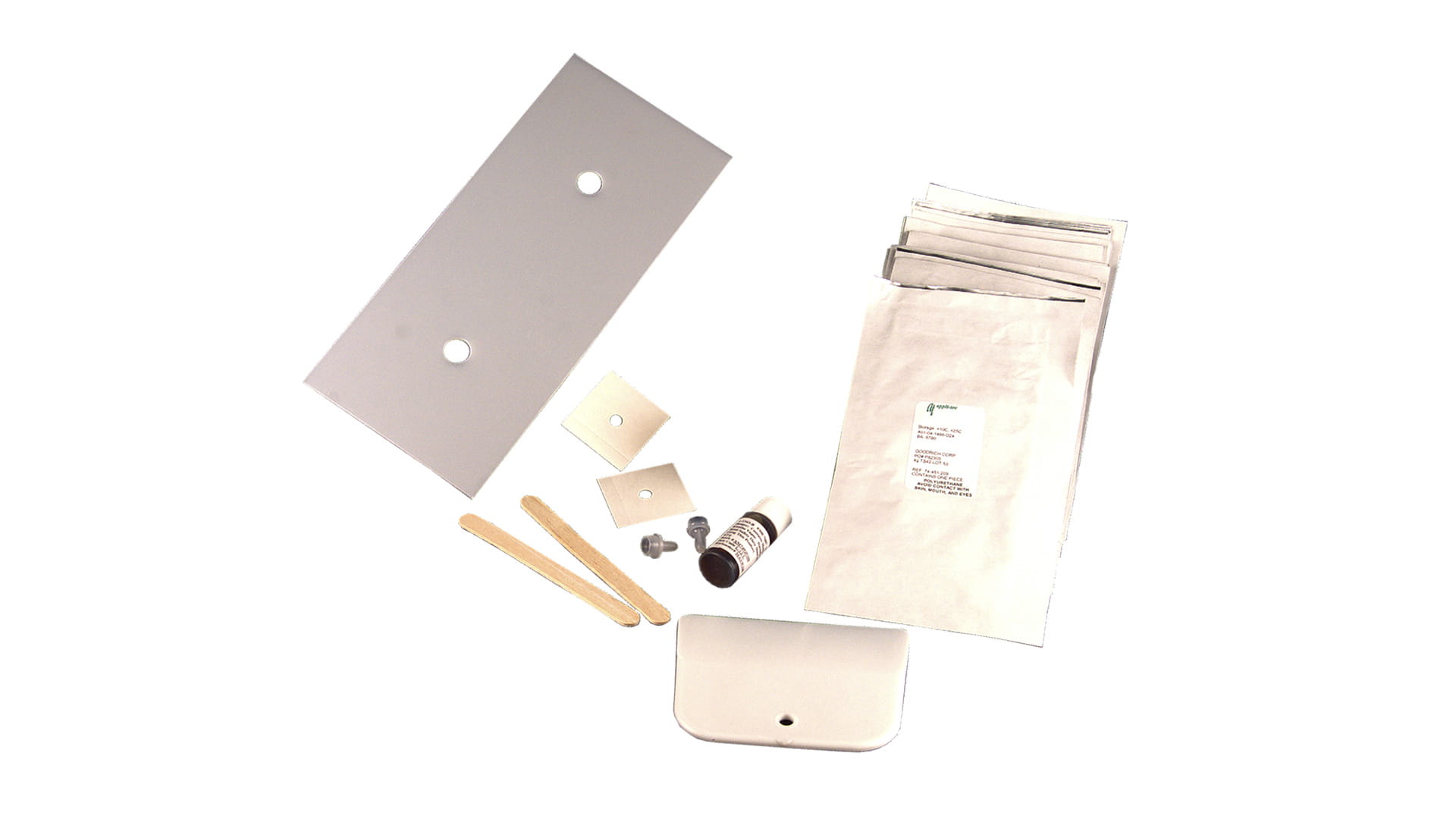 Components of a pinhole repair kit for de-icers