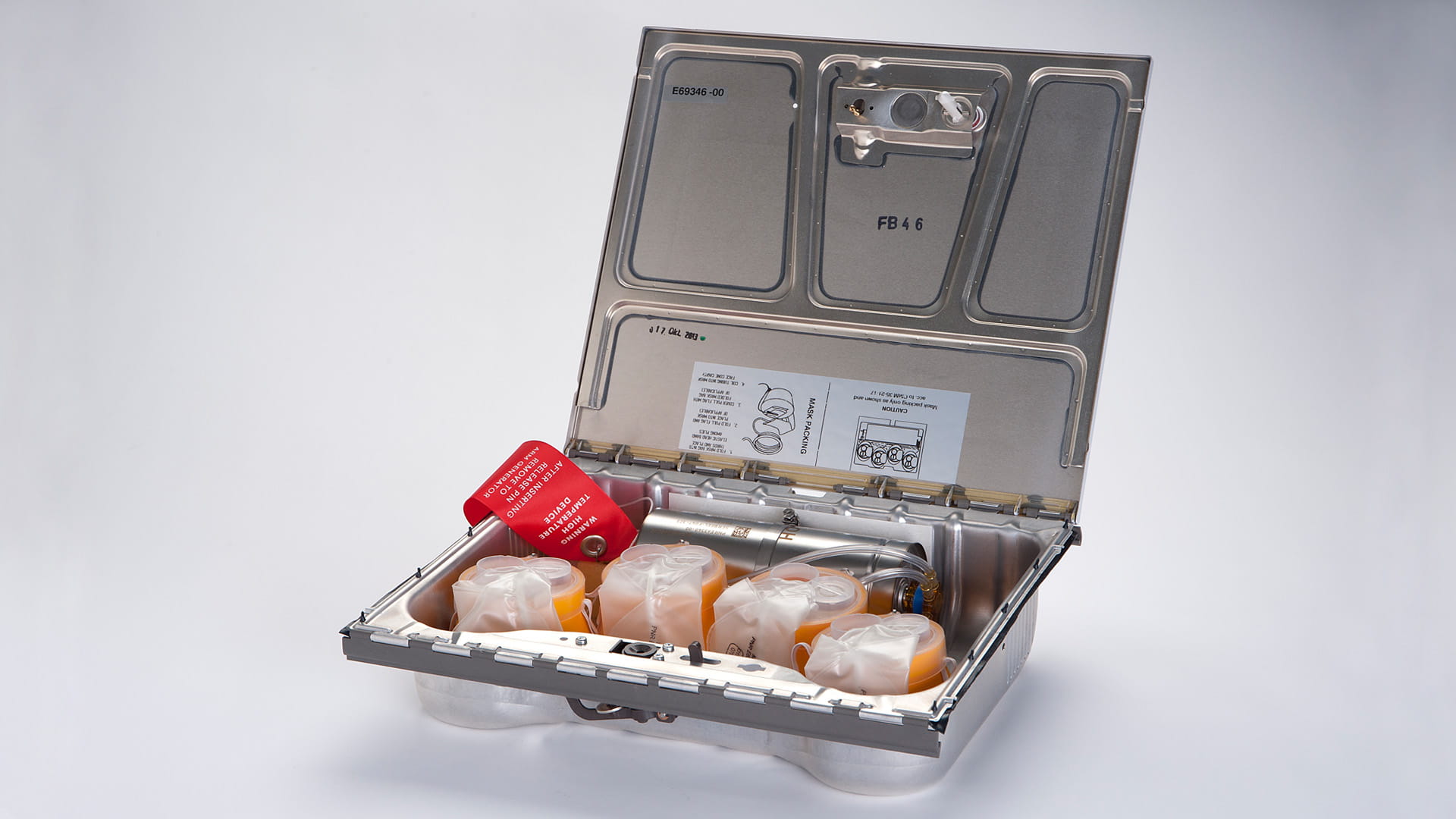 Chemical oxygen system unit with lid open.