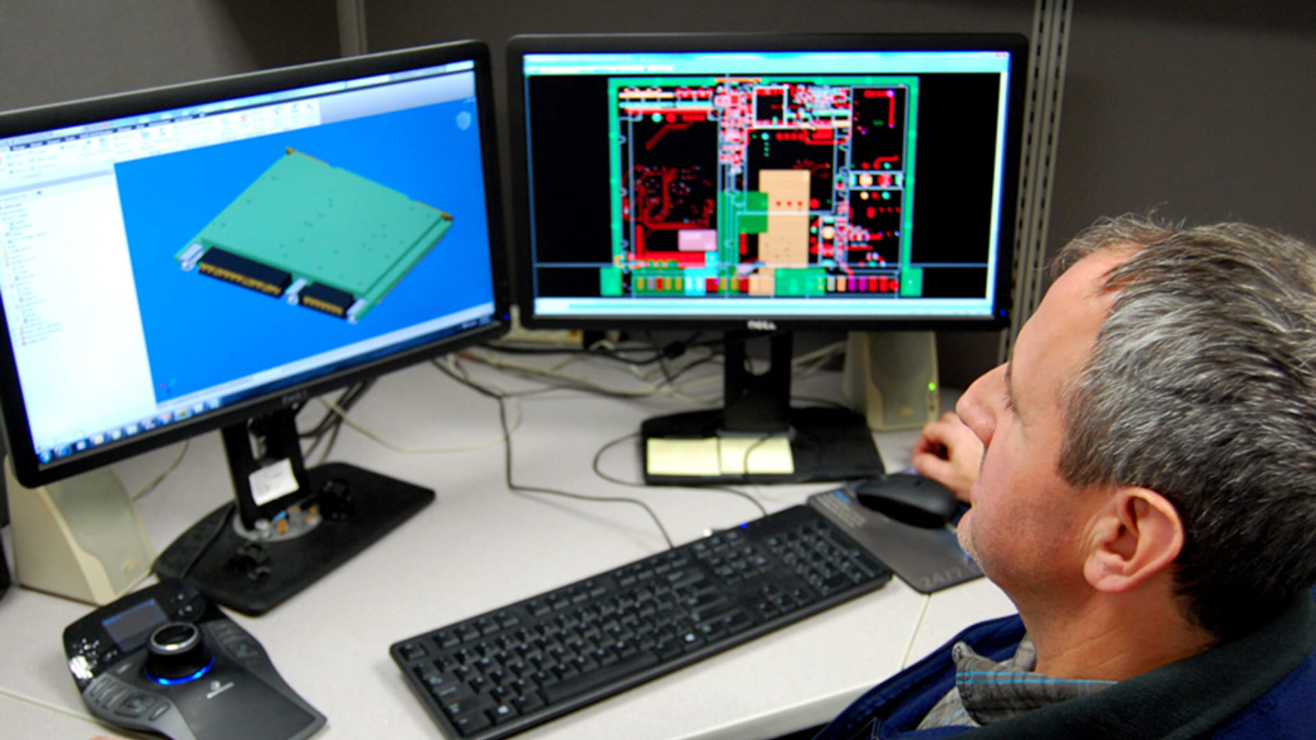 Engineer using CAD software on computer