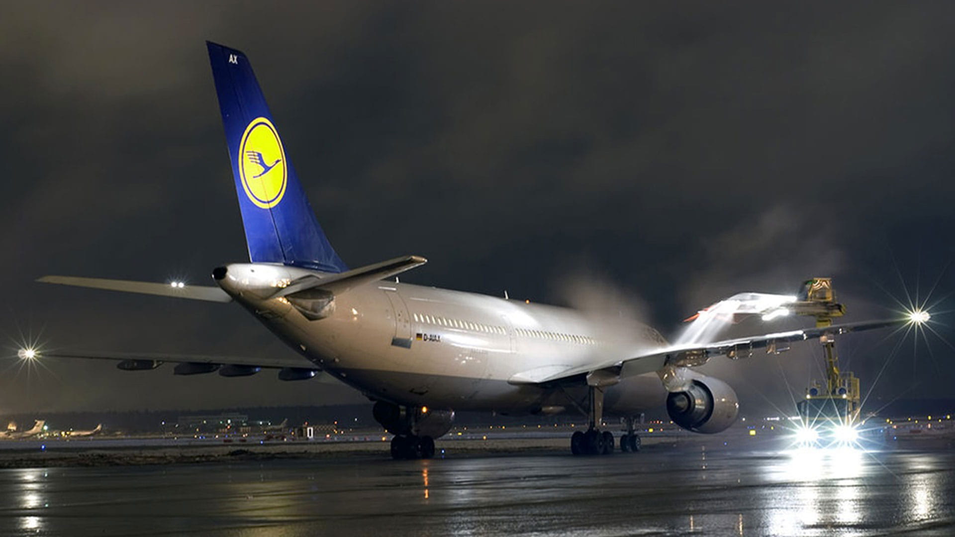 A logo light on the side of an aircraft