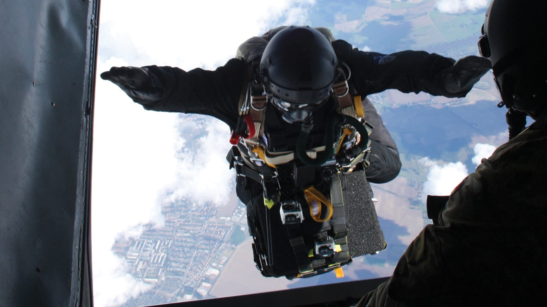 Person jumping off plane
