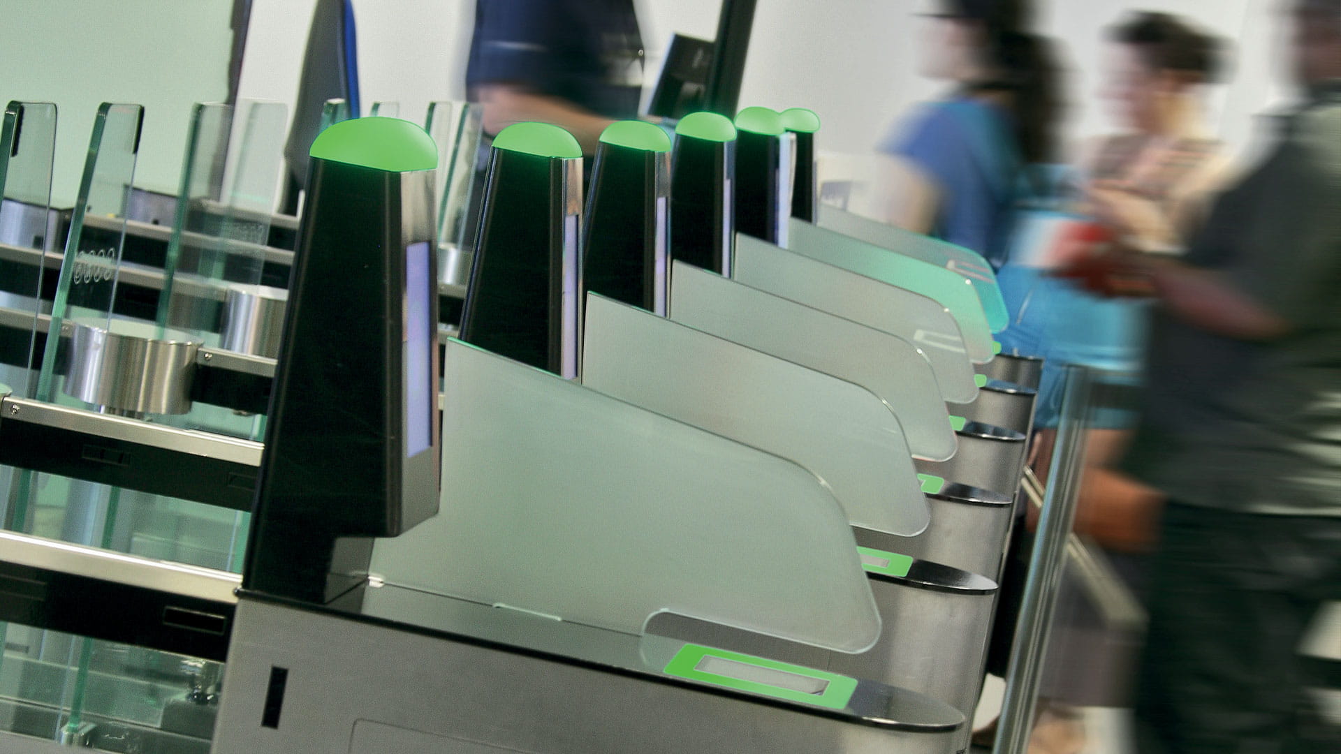 Main looking out window of an airport terminal