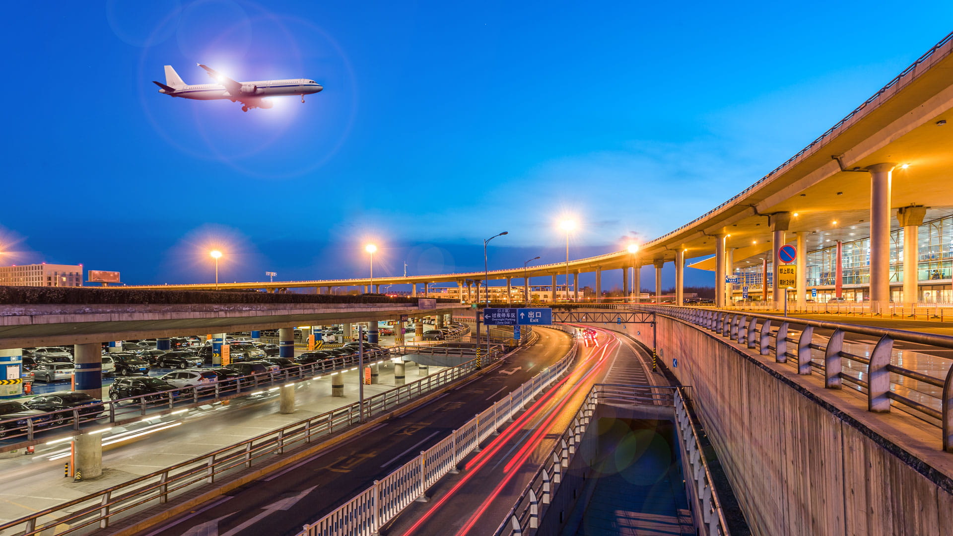 Airplane flying over an airport