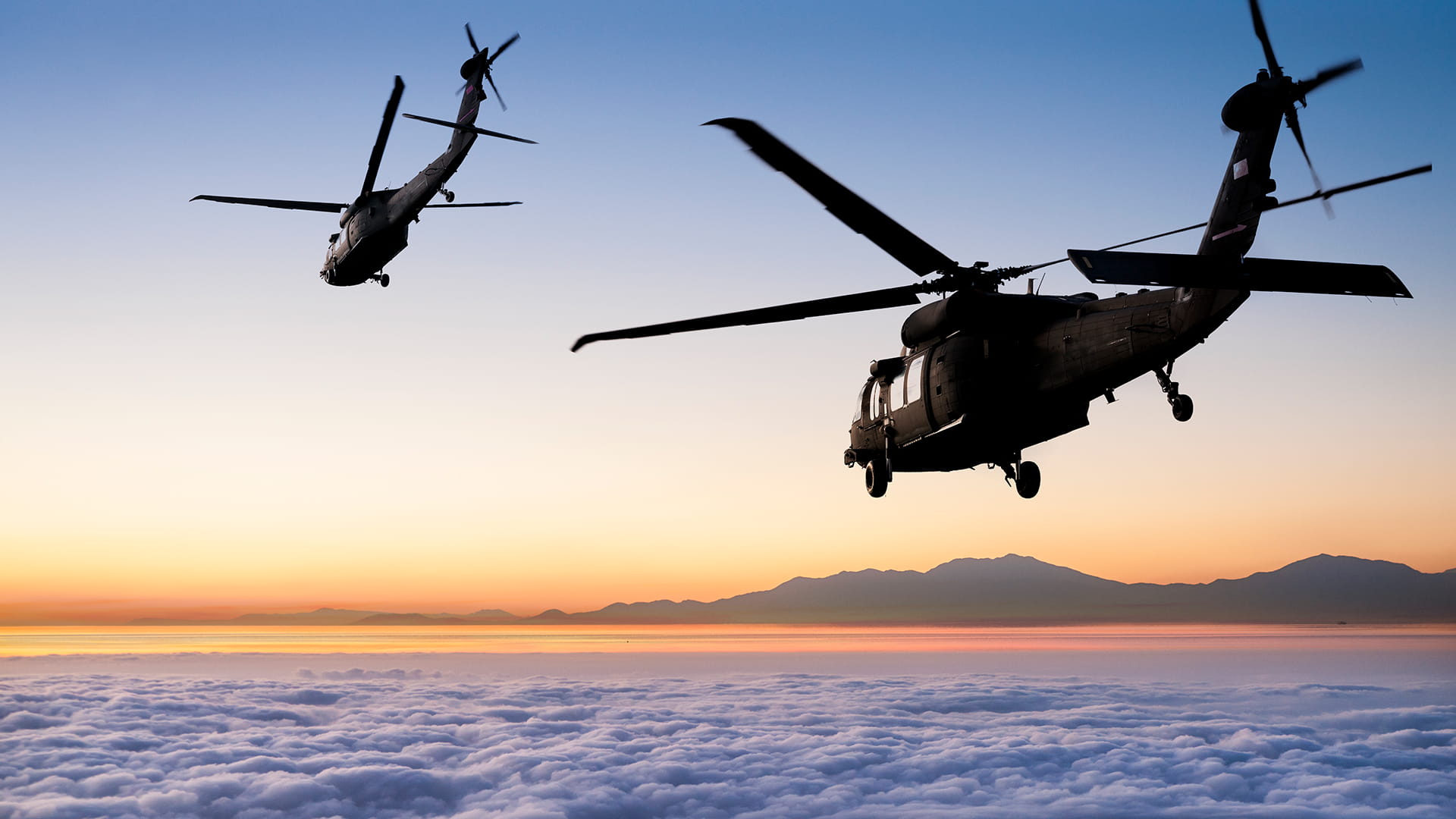 Helicopters above the clouds