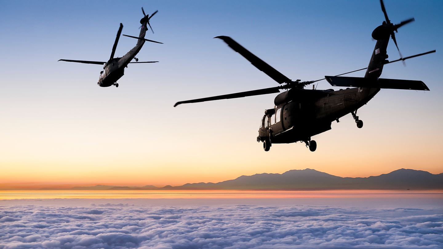 Helicopters above the clouds