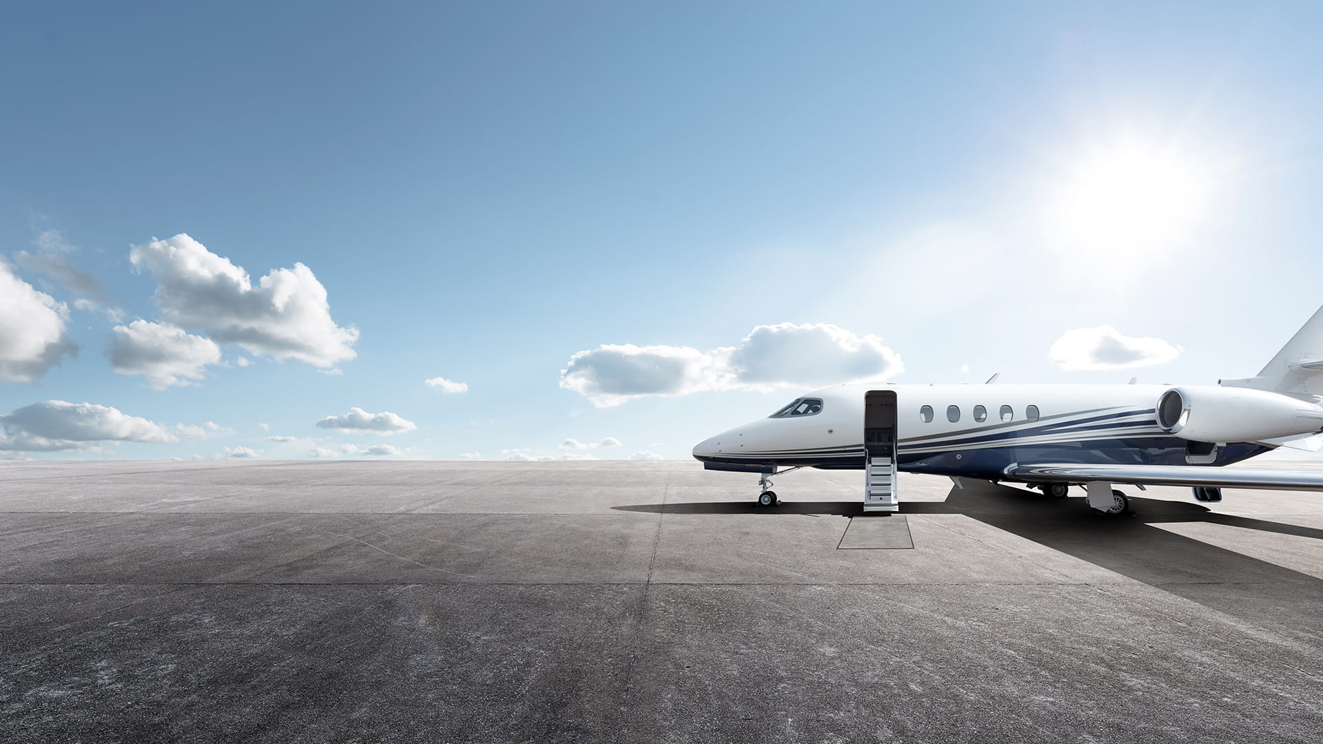 Cessna plane on runway sideview