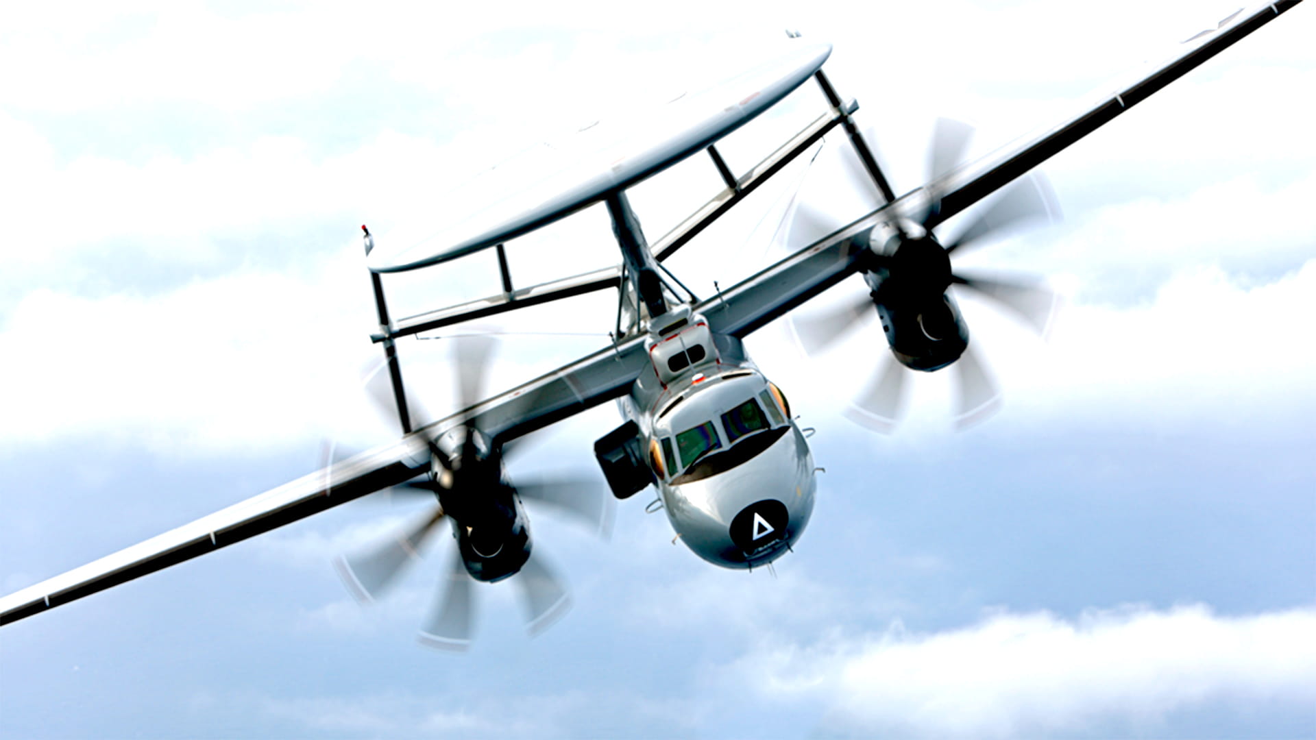 Military plane front view flying