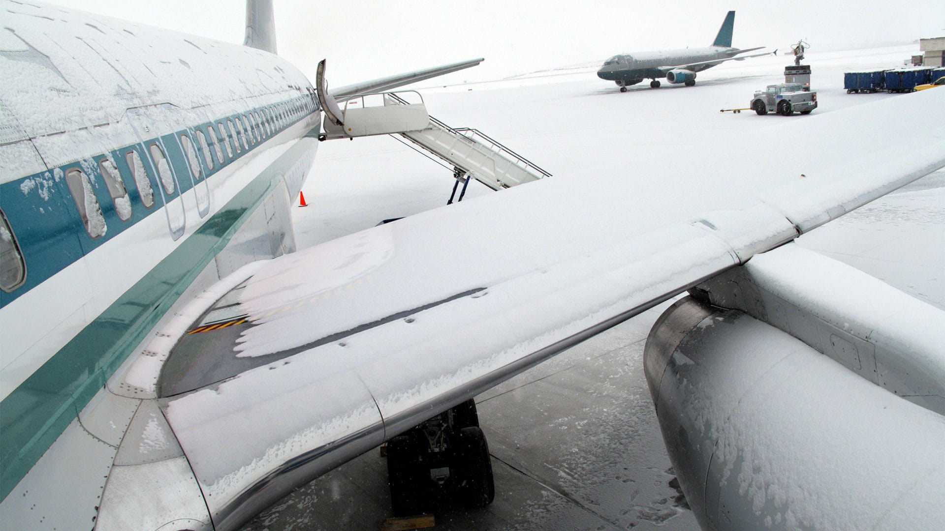 Airplanes on a snowy runway
