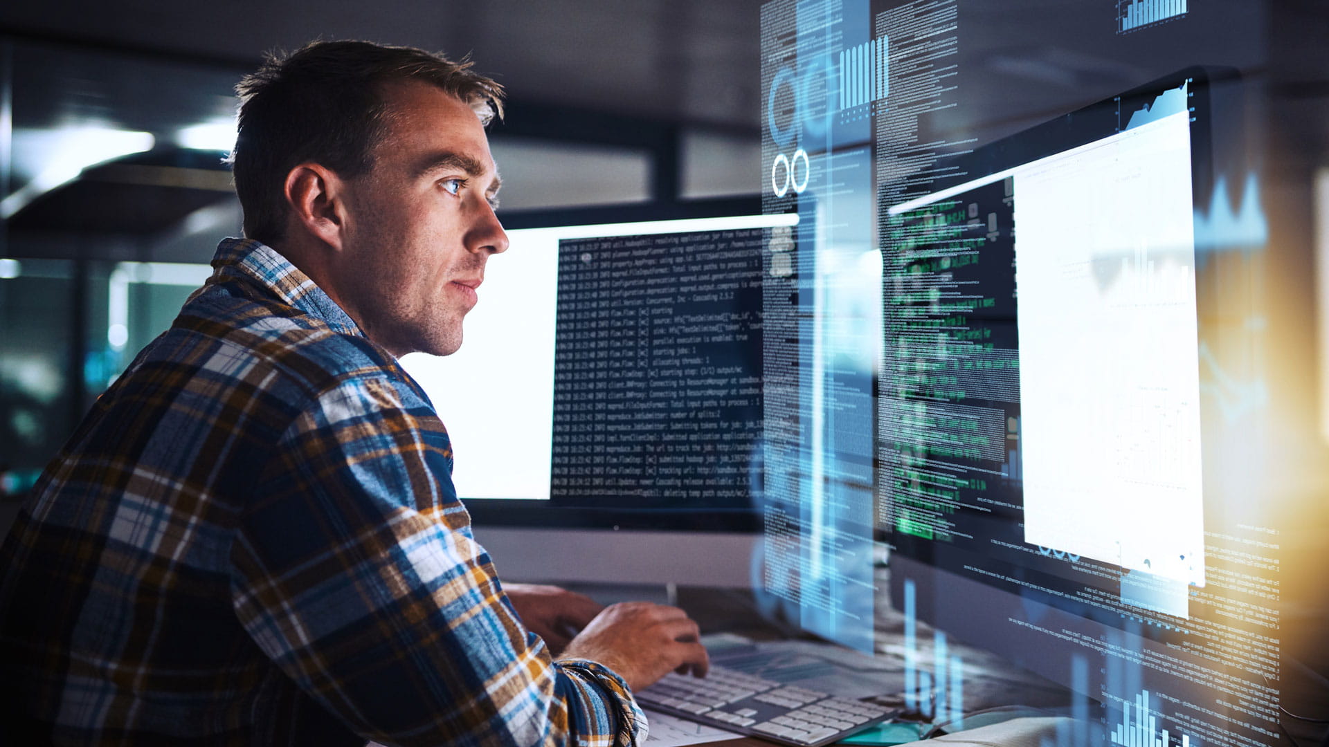 Man looking at computer monitor