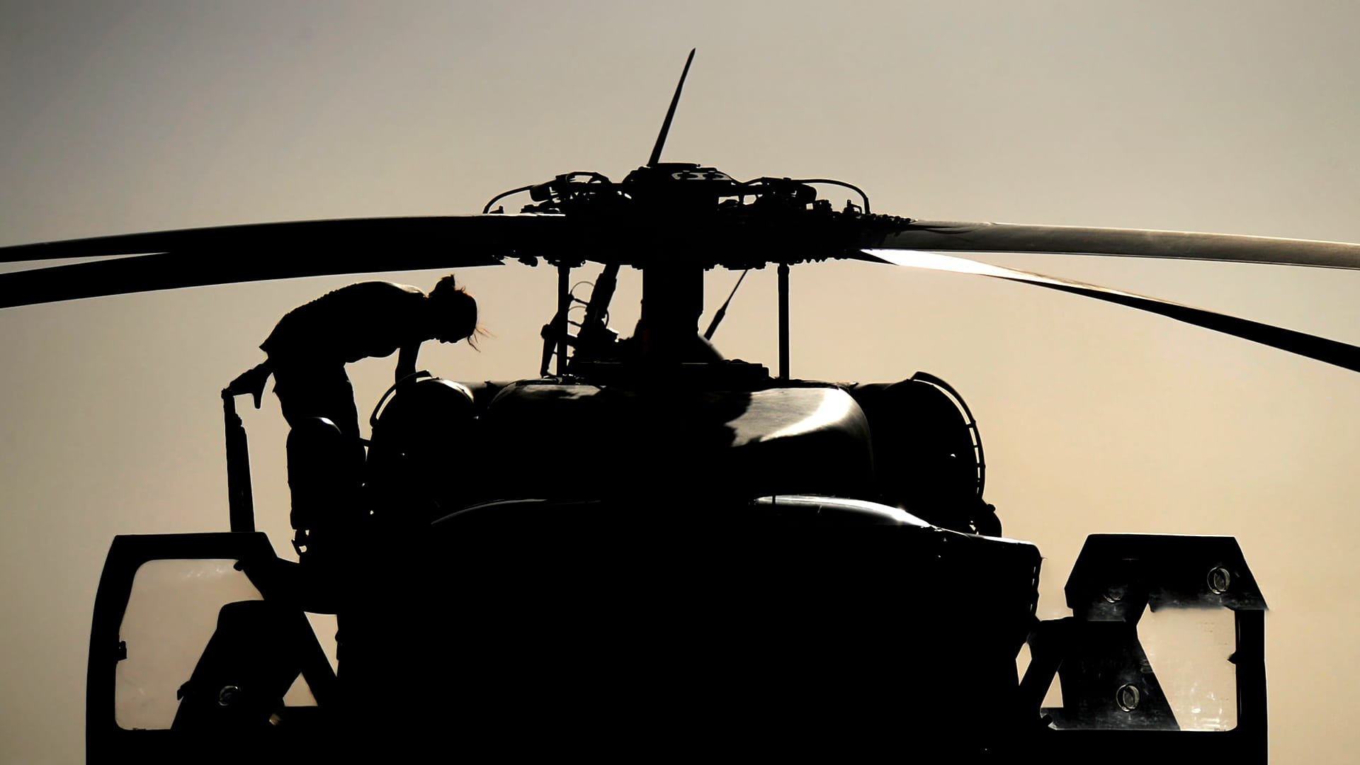Silhouette of helicopter