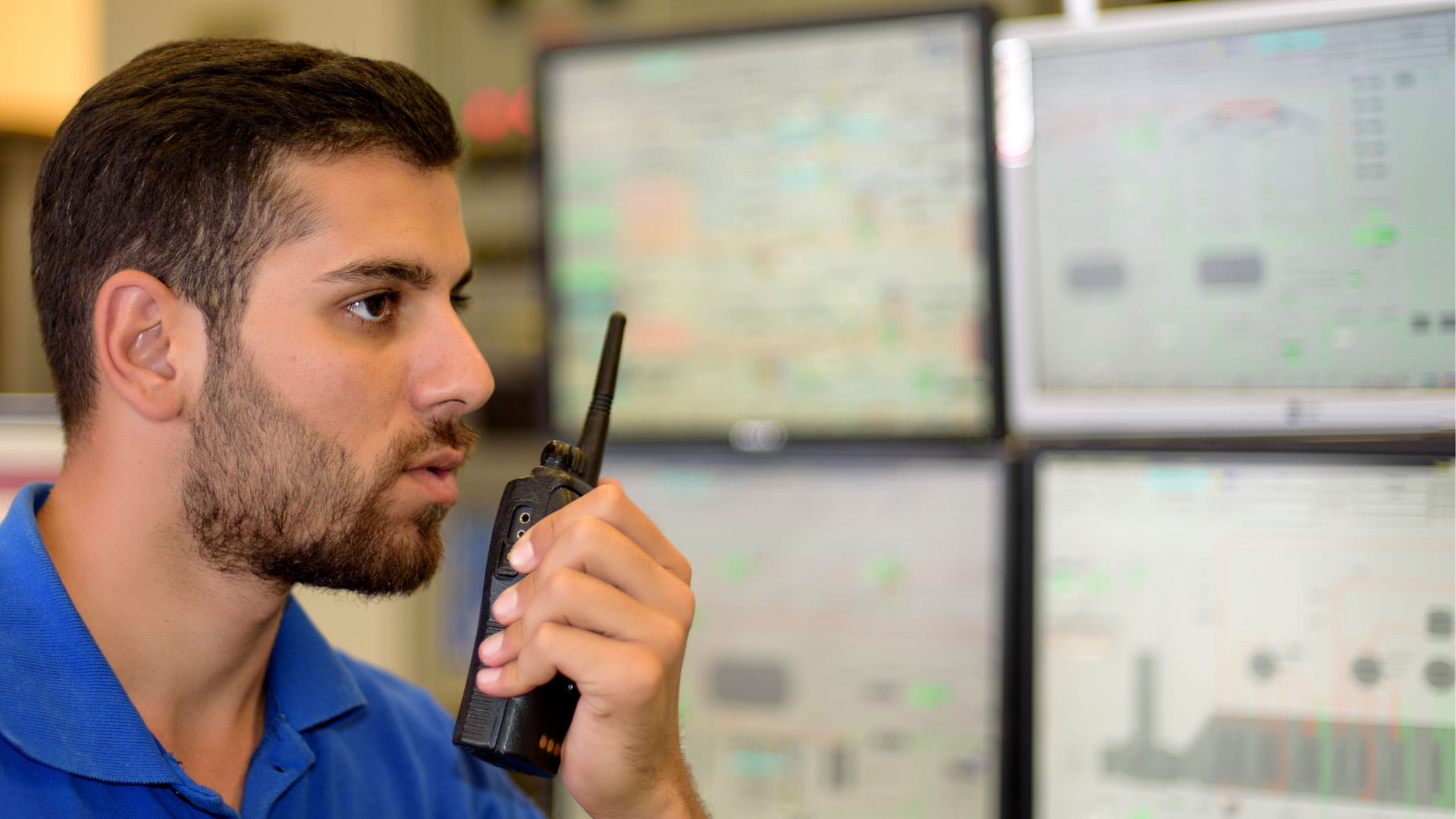 Man speaking into a wireless handset