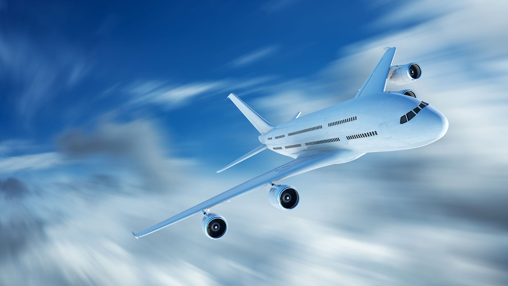 White airplane flying through the wind