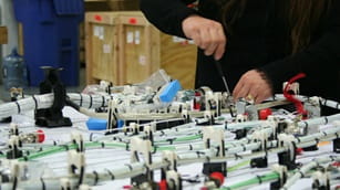 Hands working with Wire Harnessing