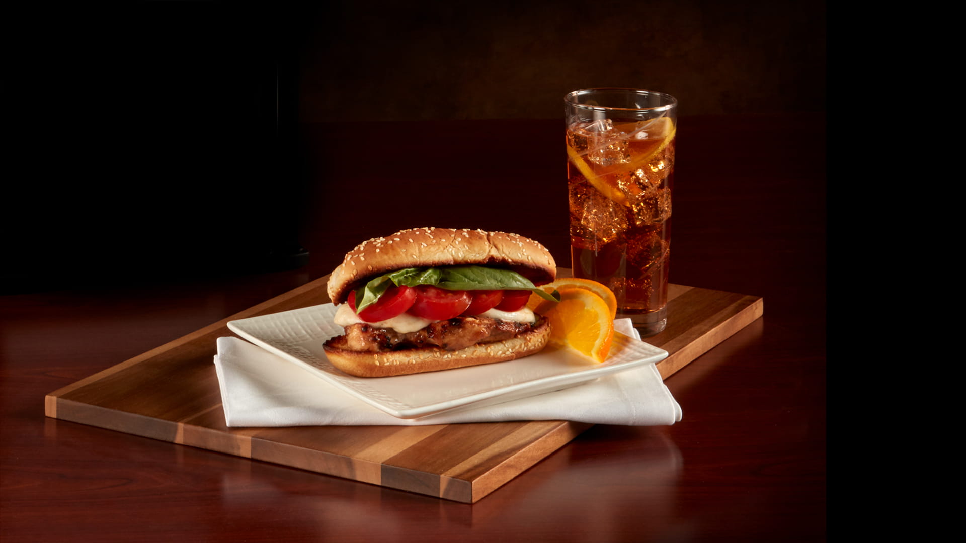 grilled burger and ice team on a charcuterie board