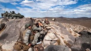 Troops on the ground highlighting TacNet Weapon Data Link