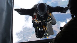 A person jumping out of an airplane