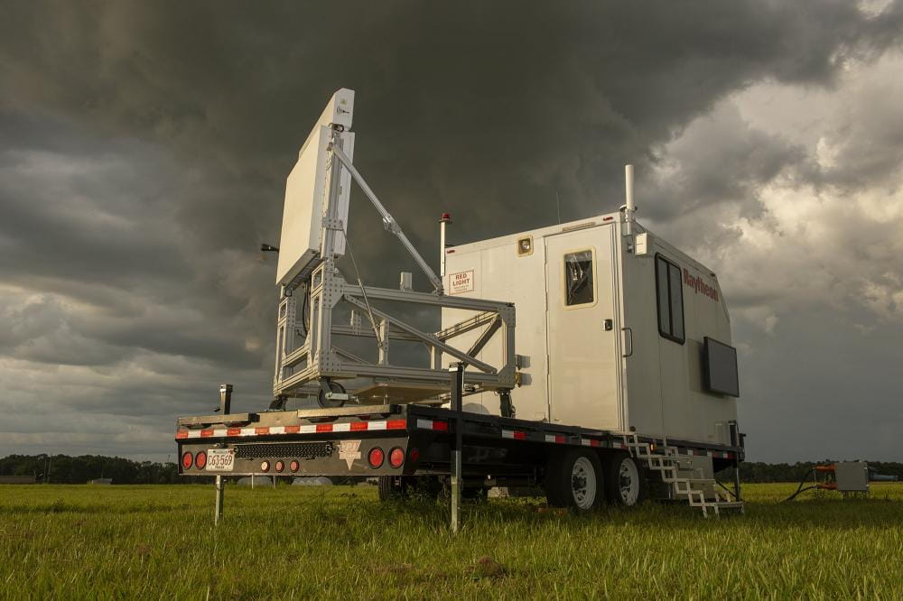 A weather event surrounds a Skyler radar as it senses the storm in the distance.