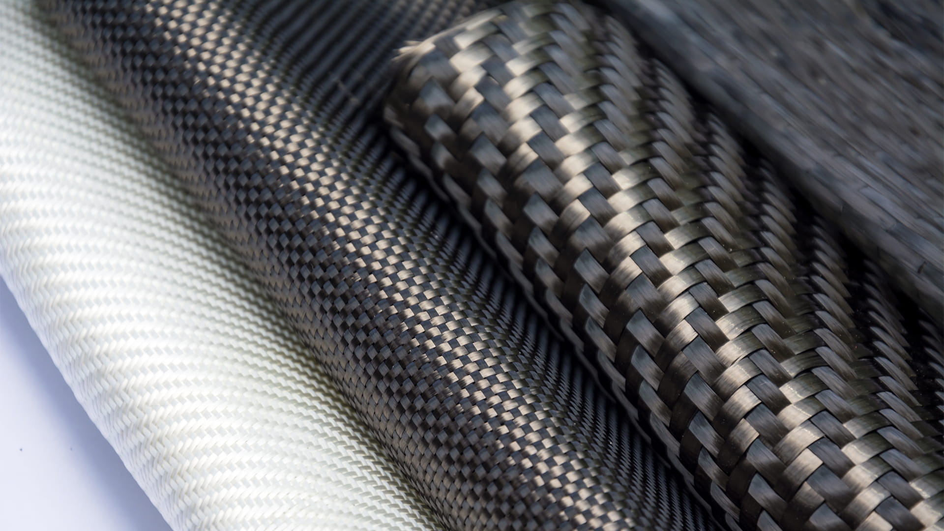 Black carbon fiber composite product material background