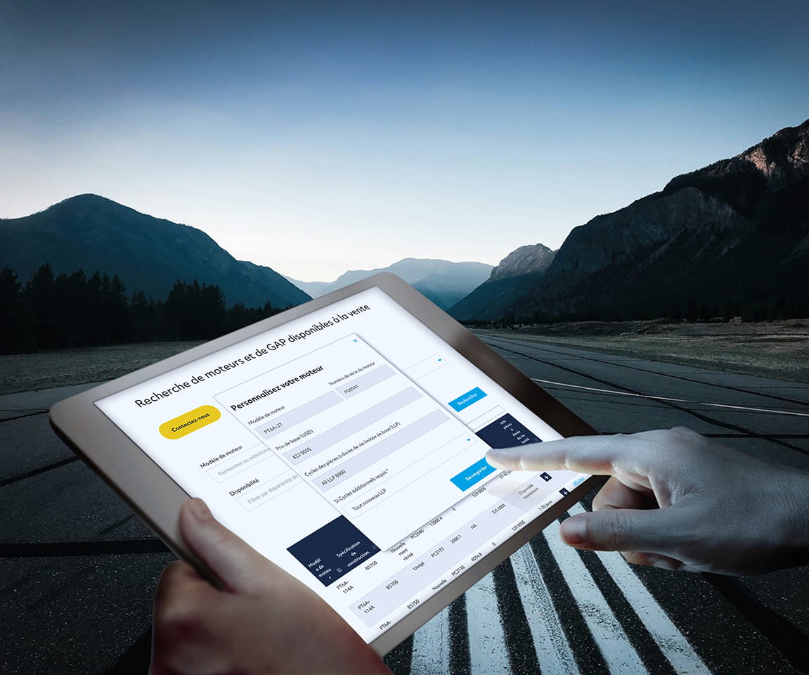 Close-up of hands holding a tablet