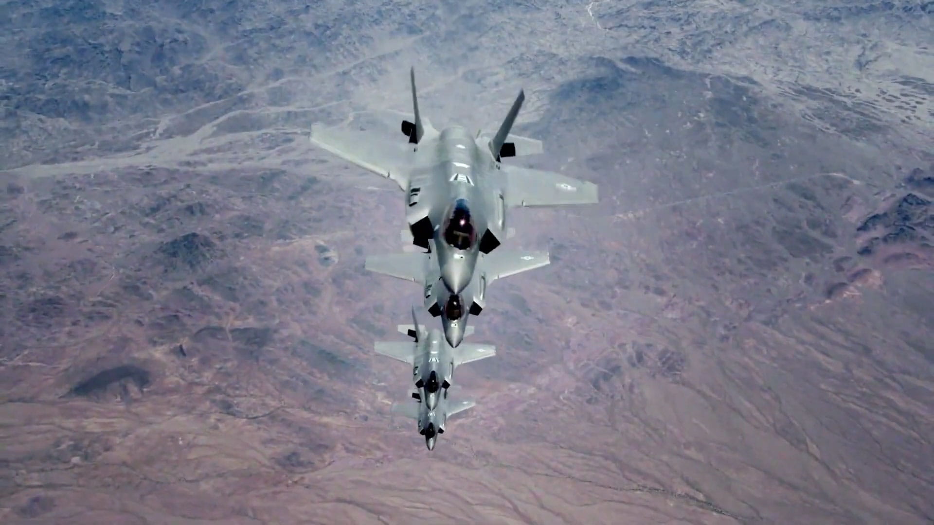 Four F-35s in flight