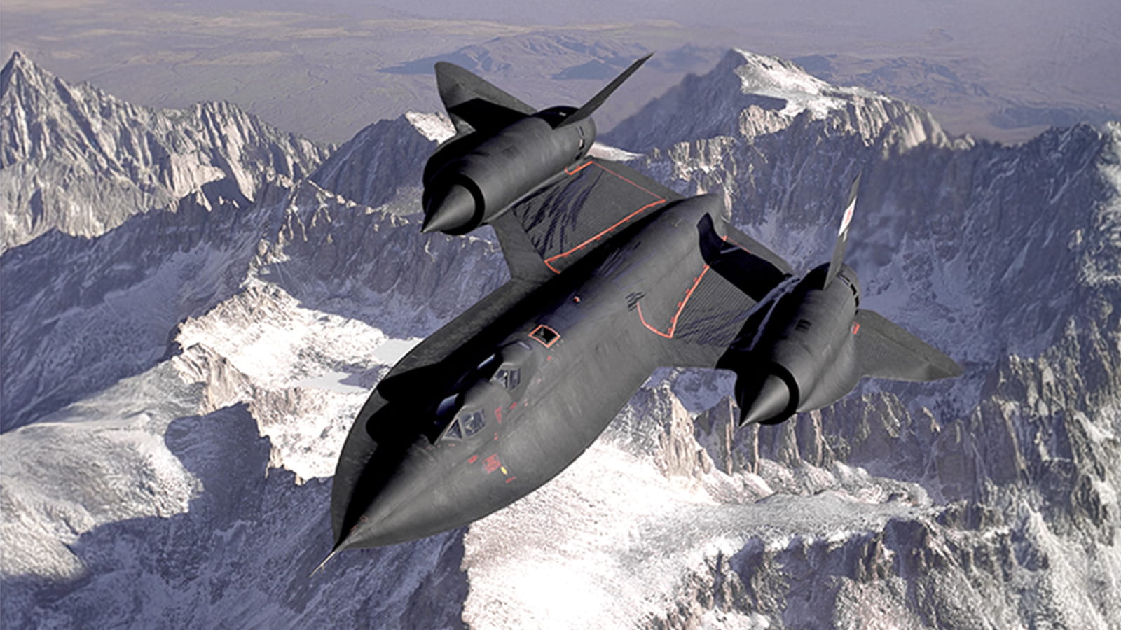 fighter jet in flight over mountains