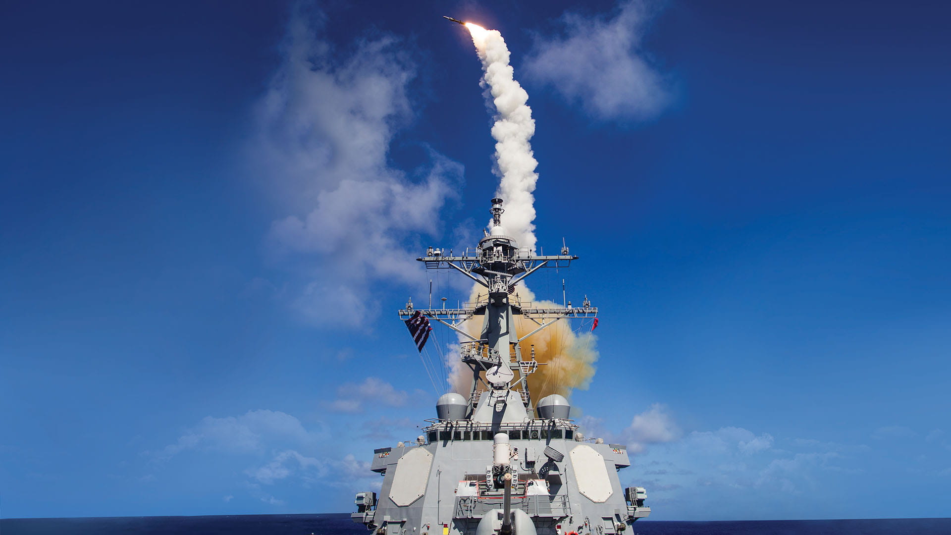 a missile launches off a battle ship