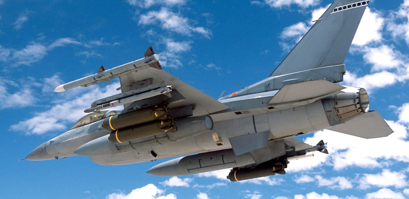 An F-16 Fighting Falcon flies near China Lake Naval Air Weapons Center during a successful AIM-9X® missile test. (Photo: U.S. Air Force)