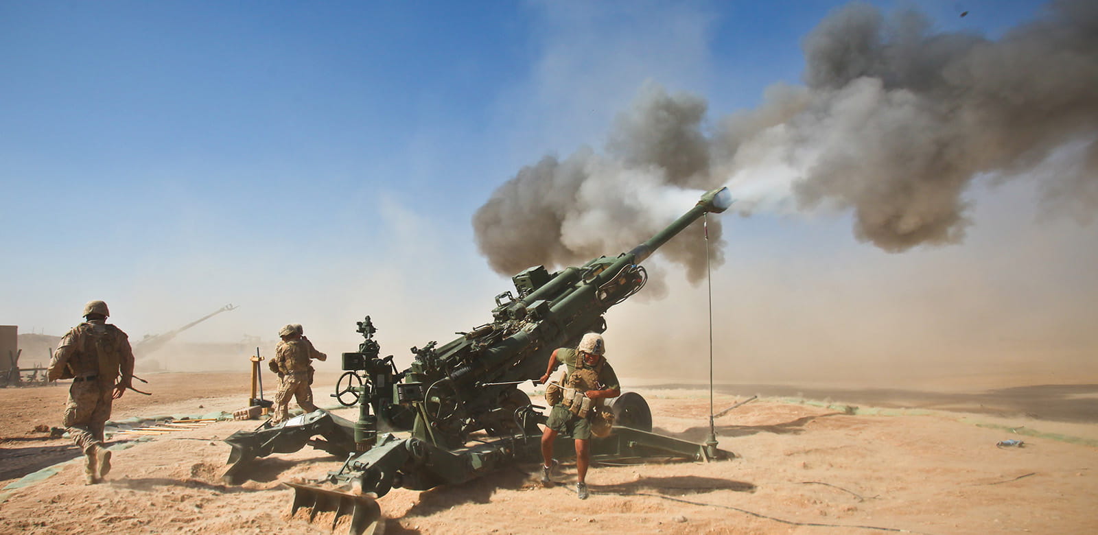 U.S. Marines fire an M982 Excalibur projectile round from an M777 155 mm howitzer during a fire support mission at Fire Base Fiddlers Green, Helmand province. (Photo: U.S. Department of Defense)
