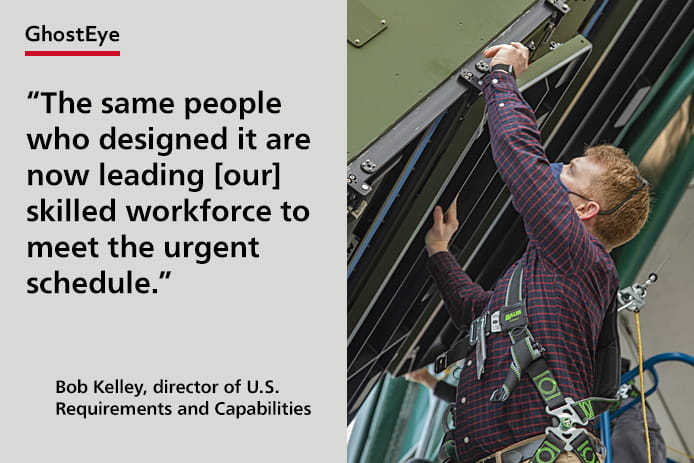 An engineer works on Raytheon 's GhostEye radar.