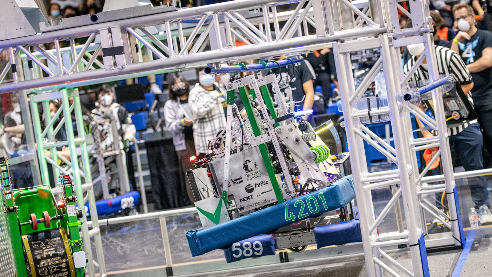 In their first qualification match of the FIRST Robotics 2022 Los Angeles Regional, The Vitruvian Bots show off the capabilities of their robot, named TakeOff, with one of the fastest high climbs at the event.