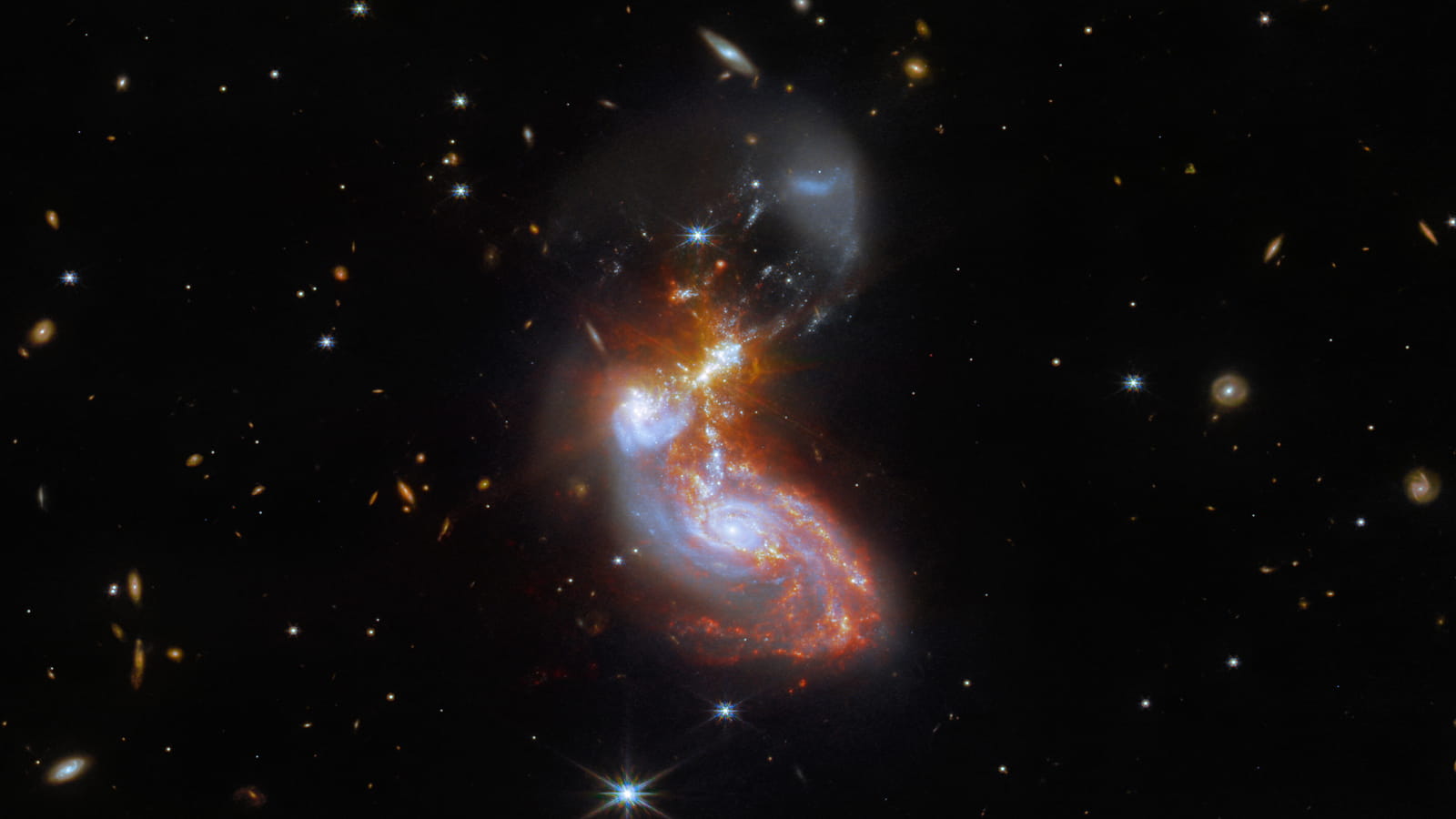 two galaxies in the process of merging